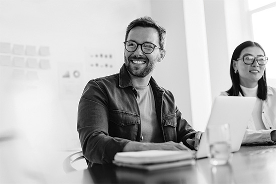 a female and male colleague in a meeting