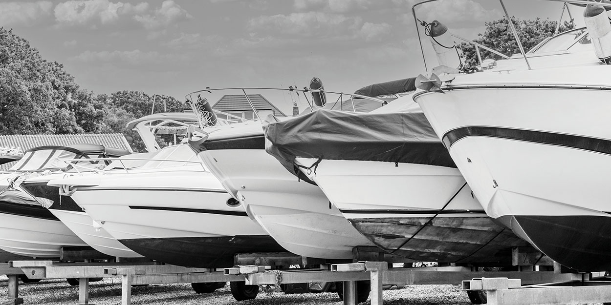 a row of boats at the marina