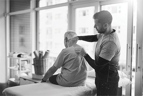 Physiotherapist with a patient